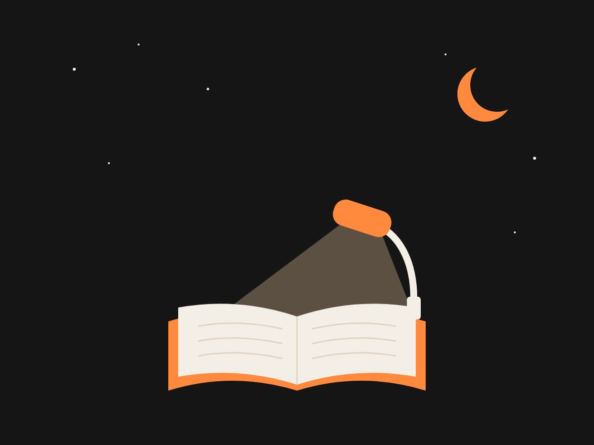 Libro abierto iluminado por una linterna de pinza, de noche